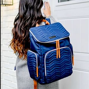 Austin Fowler Brielle baby backpack navy orange diaper